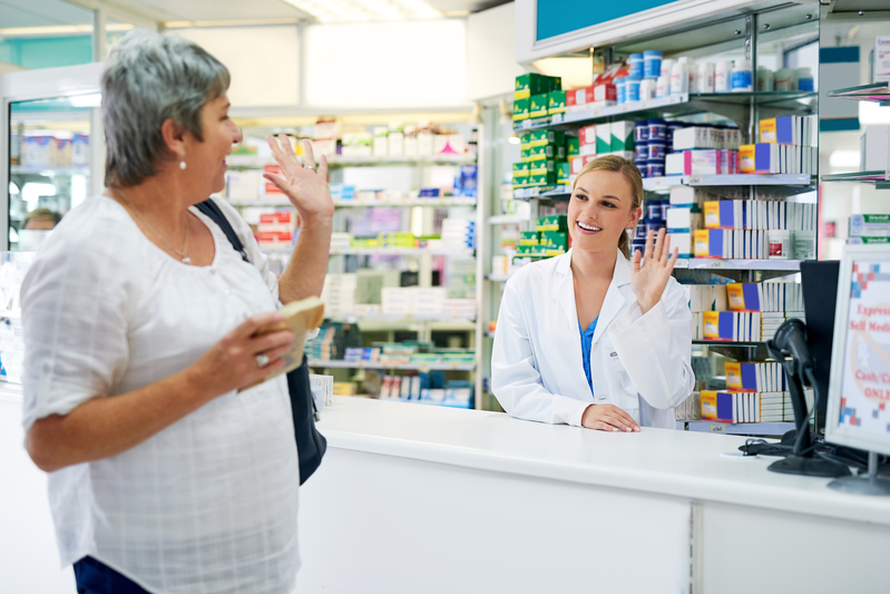 pharmacist with customer