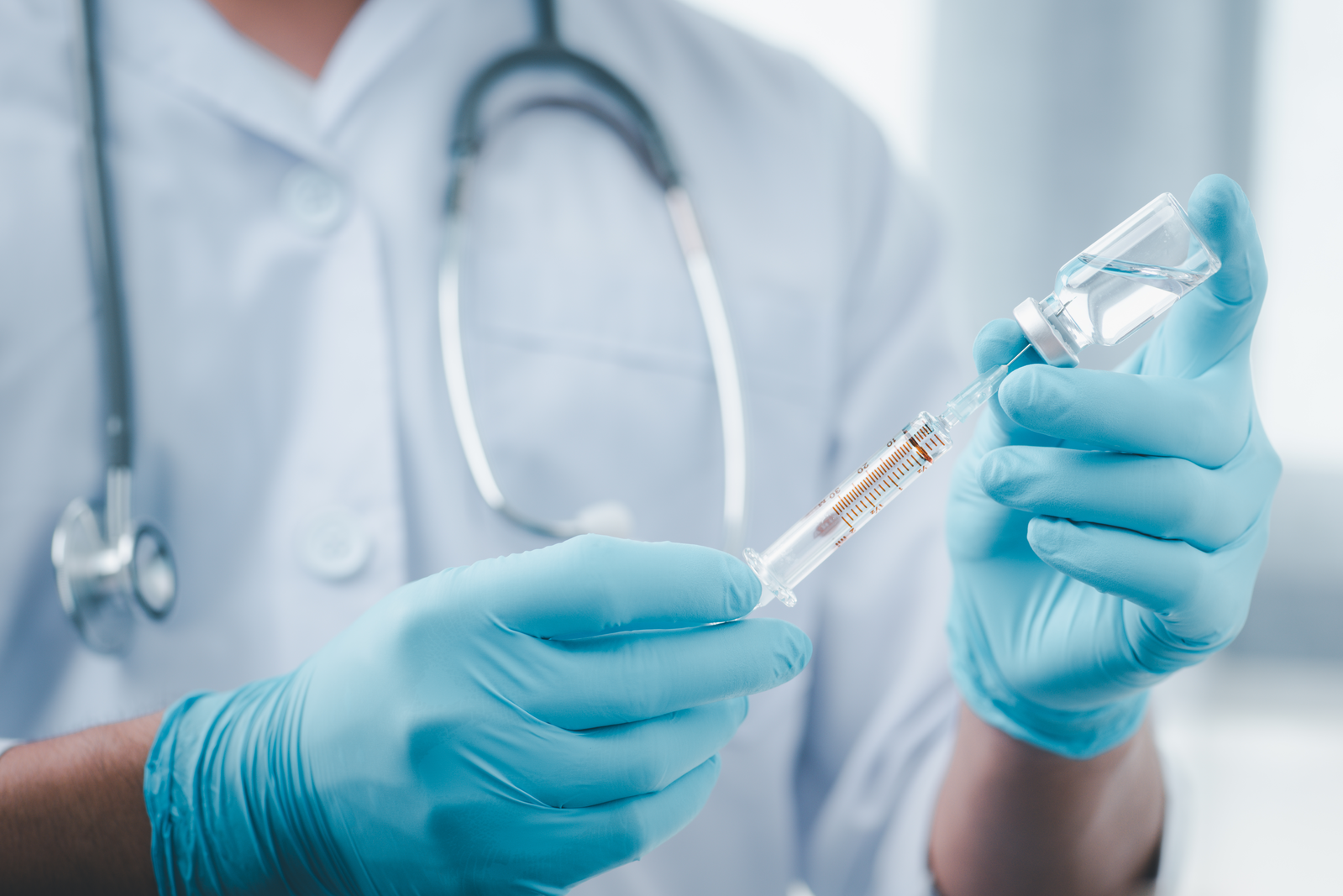 pharmacist getting a vaccination ready