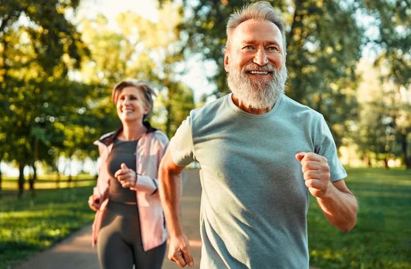 smiling couple running