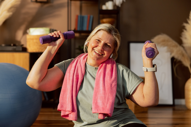 woman smiling while working out